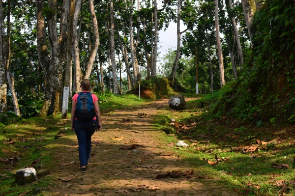 Lauren walks along a Portuguese colonial road